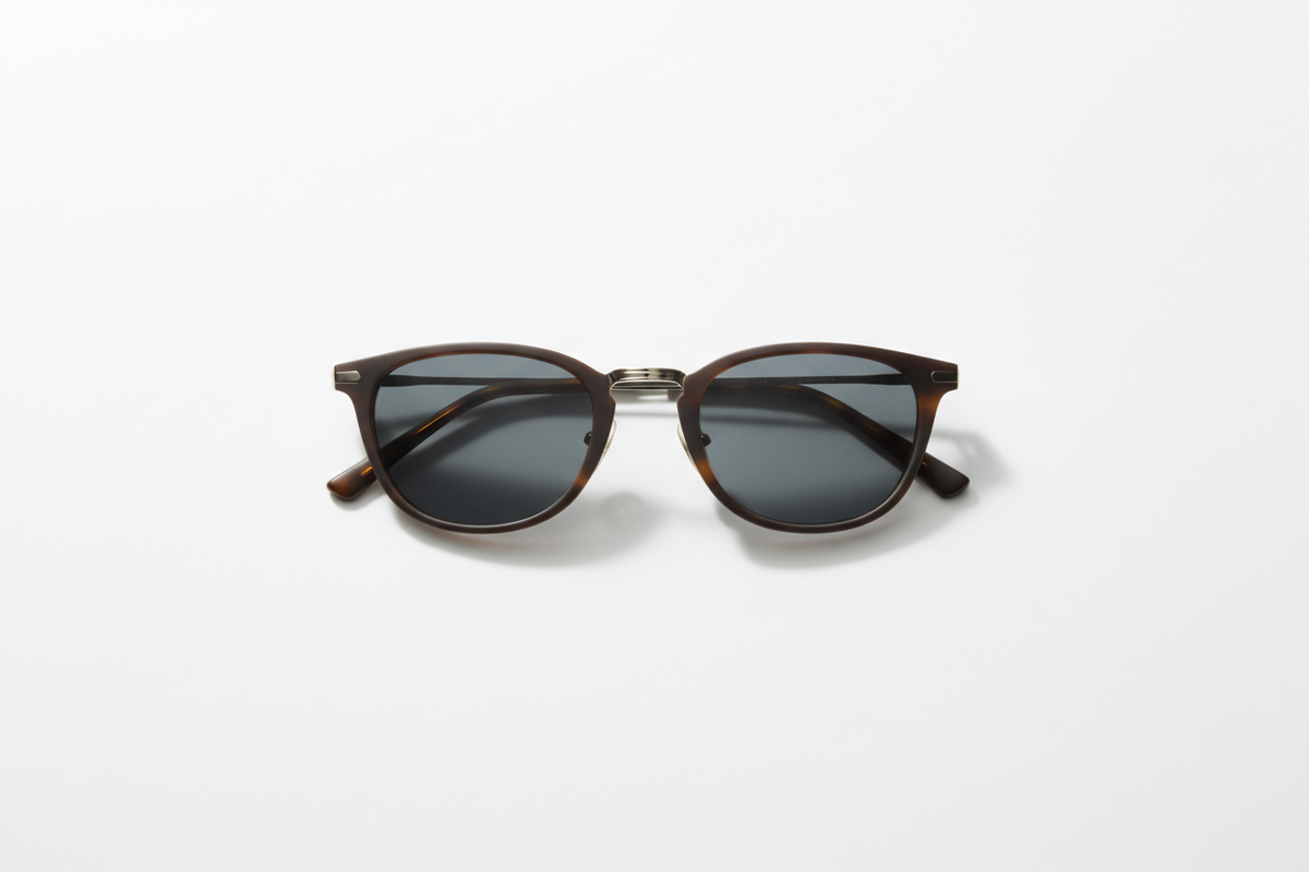Man wearing aviator sunglasses and black jacket, modern stylish men fashion look