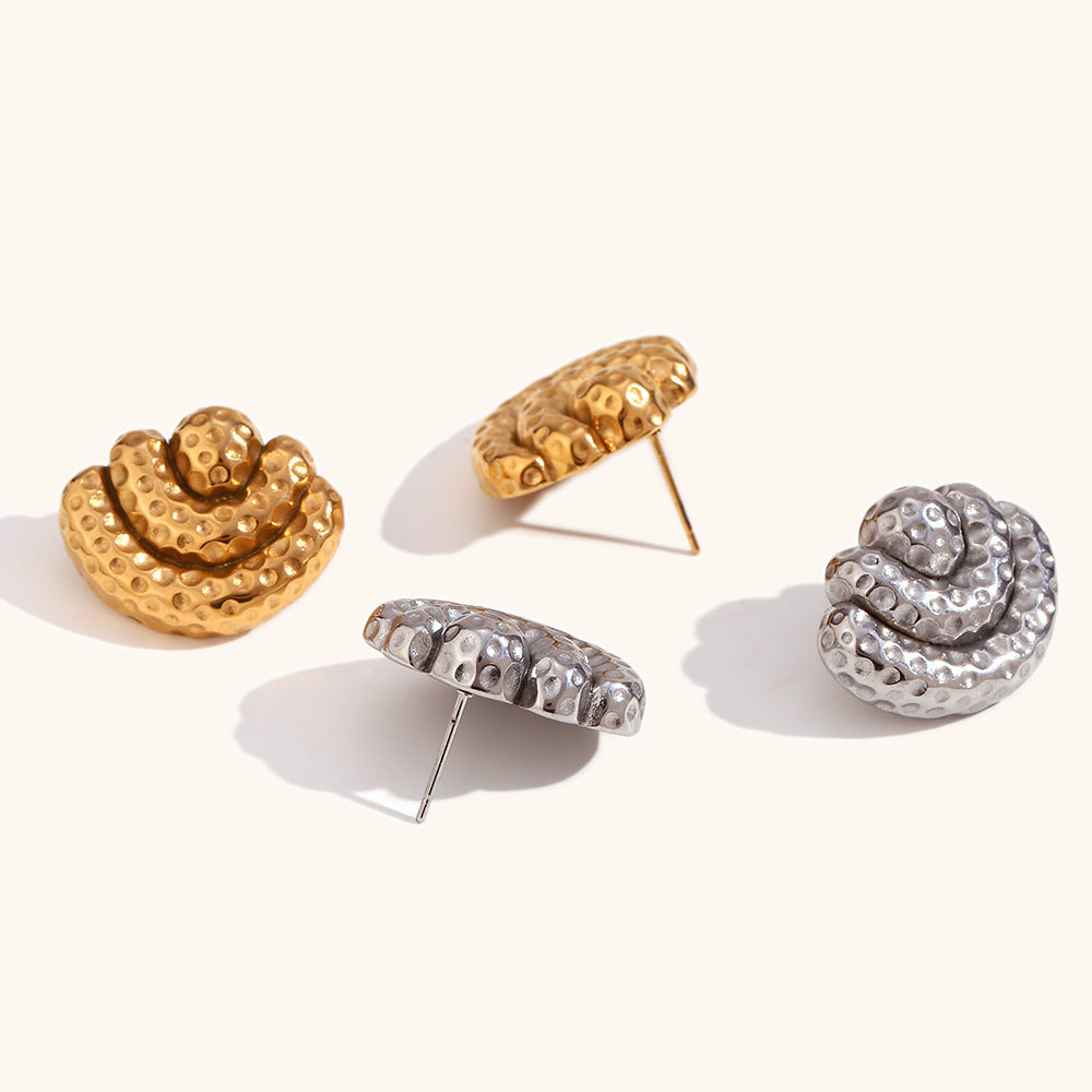 Close-up of layered scallop curves elegant drop earrings