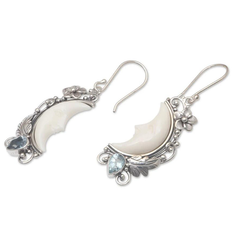 Close-up of sculpted face detail artistic earrings