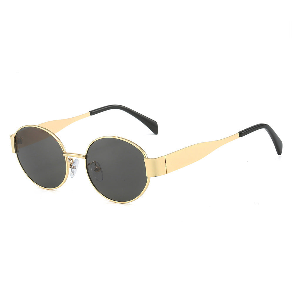 Luna Oval Sunglasses in gold frame with clear lenses
