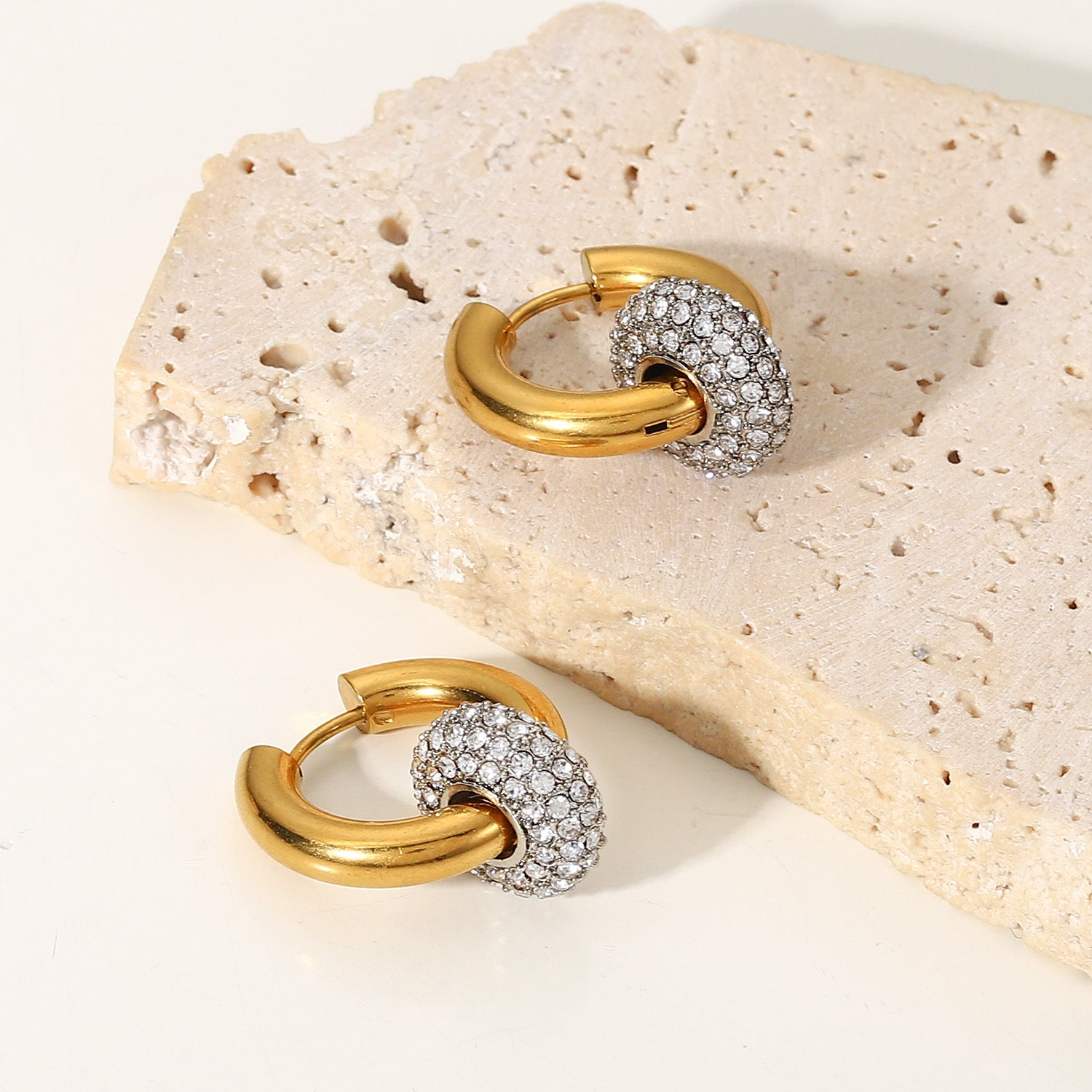 Liora Zircon Drop Earrings with crystal stones and gold finish